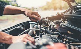 Mechanic Working in Auto Repair Service — Huntington Beach, CA — Britton's Automotive Mechanic Working in Auto Repair Service — Huntington Beach, CA — Britton's Automotive