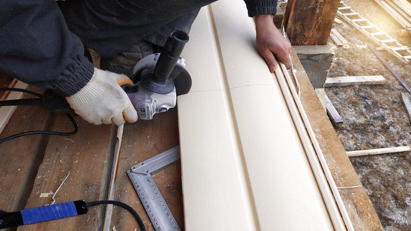 Construction Worker Cuts Siding โ Colorado Springs, CO โ Windows America Construction Worker Cuts Siding โ Colorado Springs, CO โ Windows America