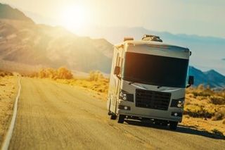 Motor Home — White Motorhome in Melbourne, FL Motor Home — White Motorhome in Melbourne, FL