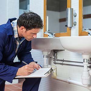 Plumber checking sinks — Plumbing in Pompton Plains, NJ Plumber checking sinks — Plumbing in Pompton Plains, NJ