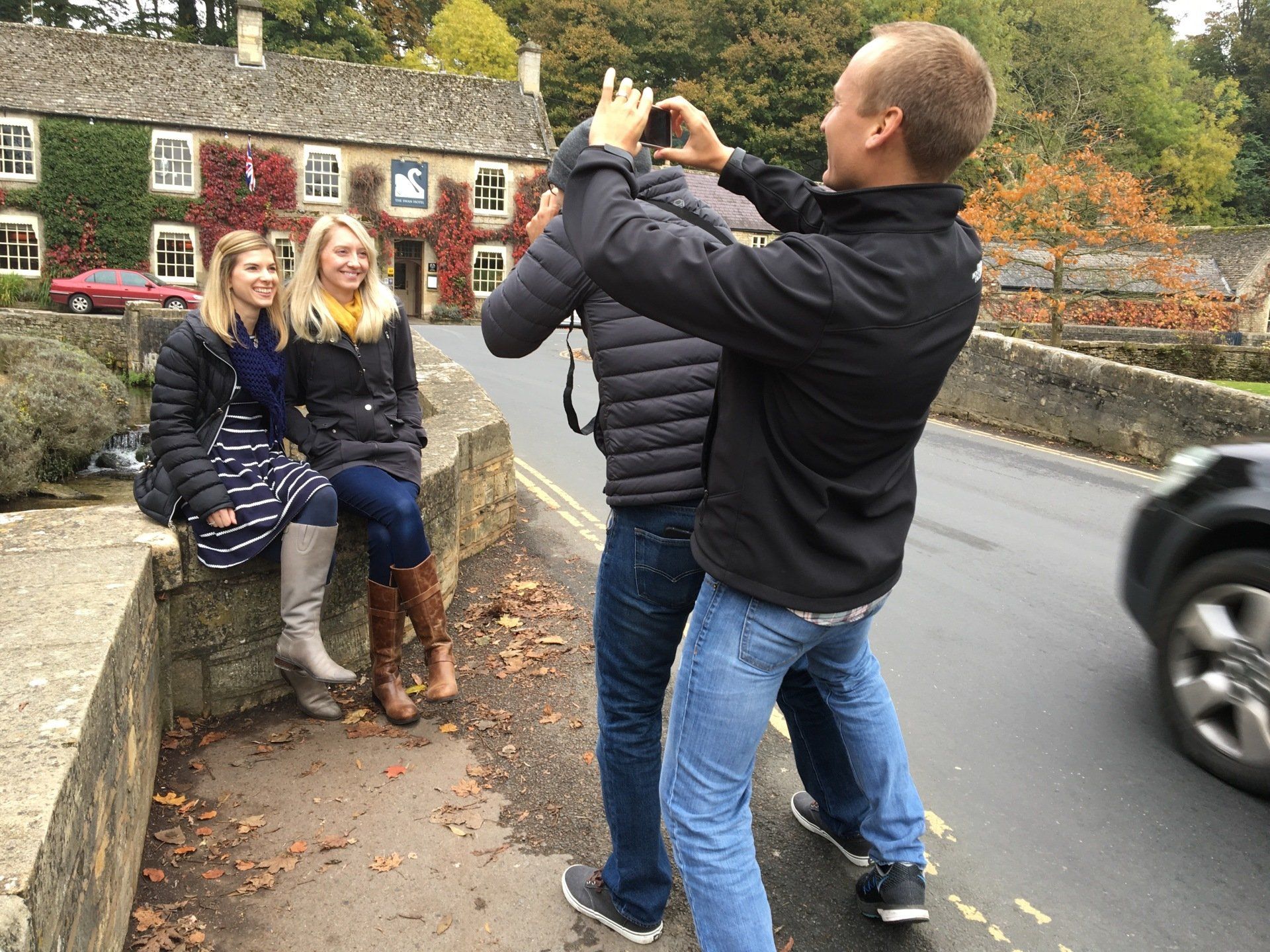 tourists having fun in Bibury
