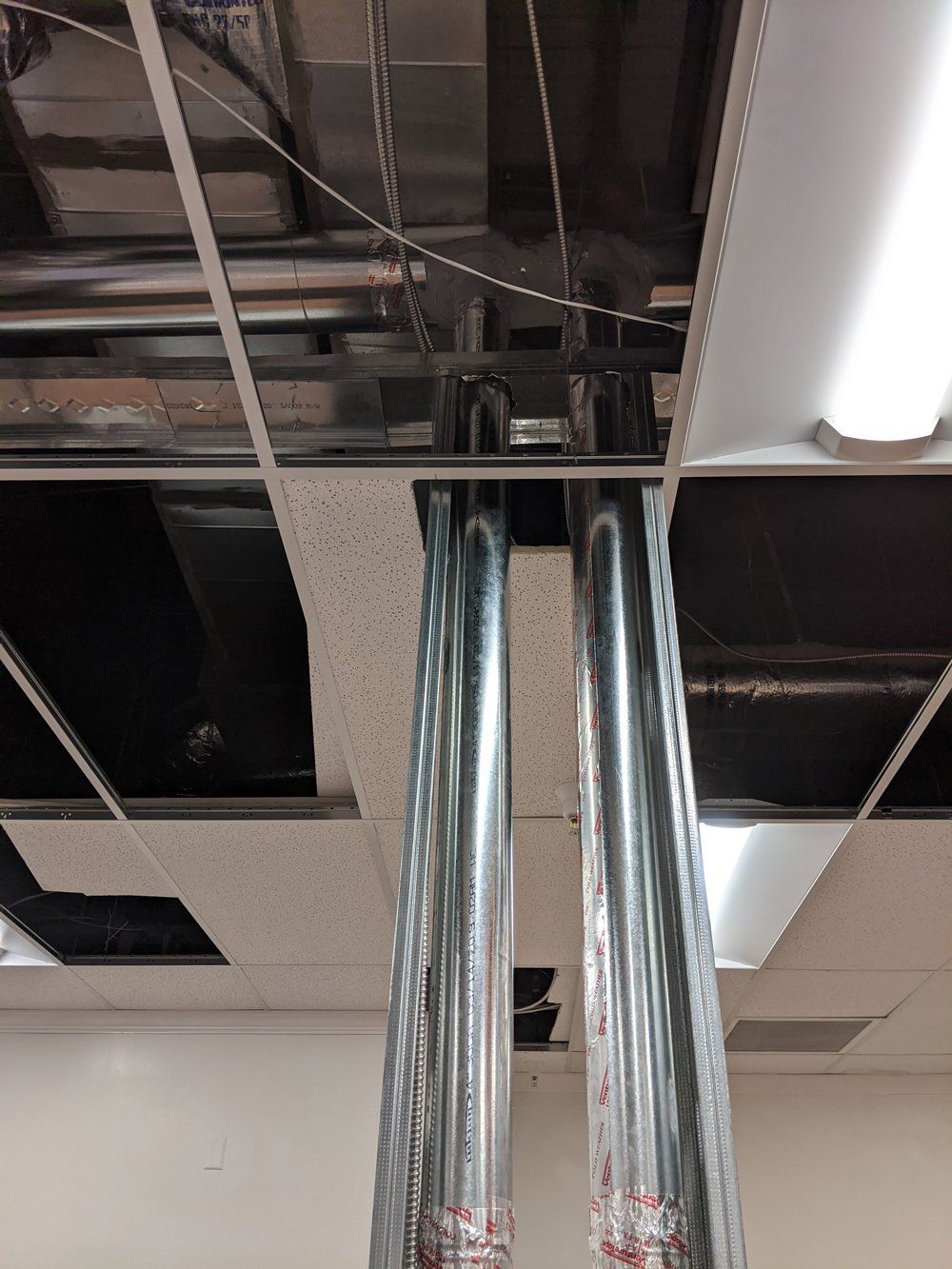 Two Vertical Aluminum — Mooresville, NC — Sutton’s HVAC Services Two Vertical Aluminum — Mooresville, NC — Sutton’s HVAC Services