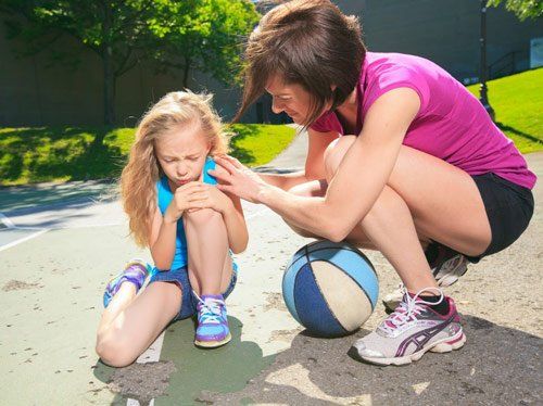 Personal Injury — Mother Playing Basketball With His Daughter in Miami, FL