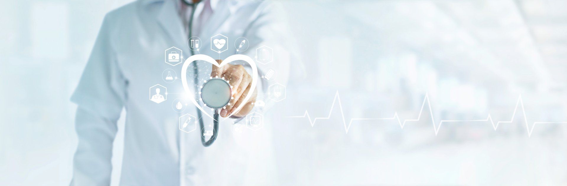 A doctor is using a stethoscope to listen to his heart. | United Critical Care