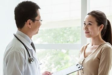 Smiling Patient on Doctor — Primary Physician in Smyrna, TN Smiling Patient on Doctor — Primary Physician in Smyrna, TN