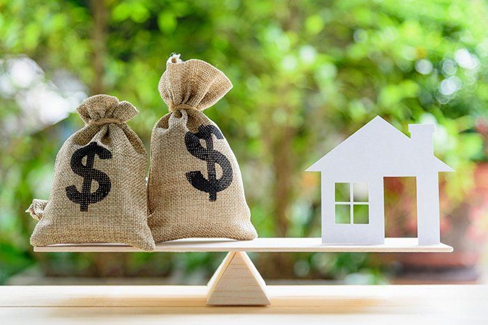 Balancing House And Investment Illustration — Outback Conveyancing Services in Alice Springs, NT Balancing House And Investment Illustration — Outback Conveyancing Services in Alice Springs, NT