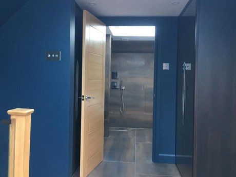 Blue walls and brown door
