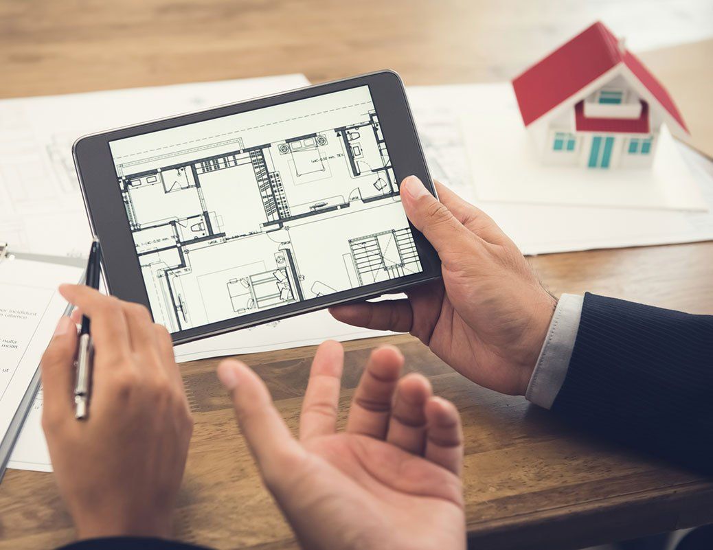 Appraisers looking at home plan