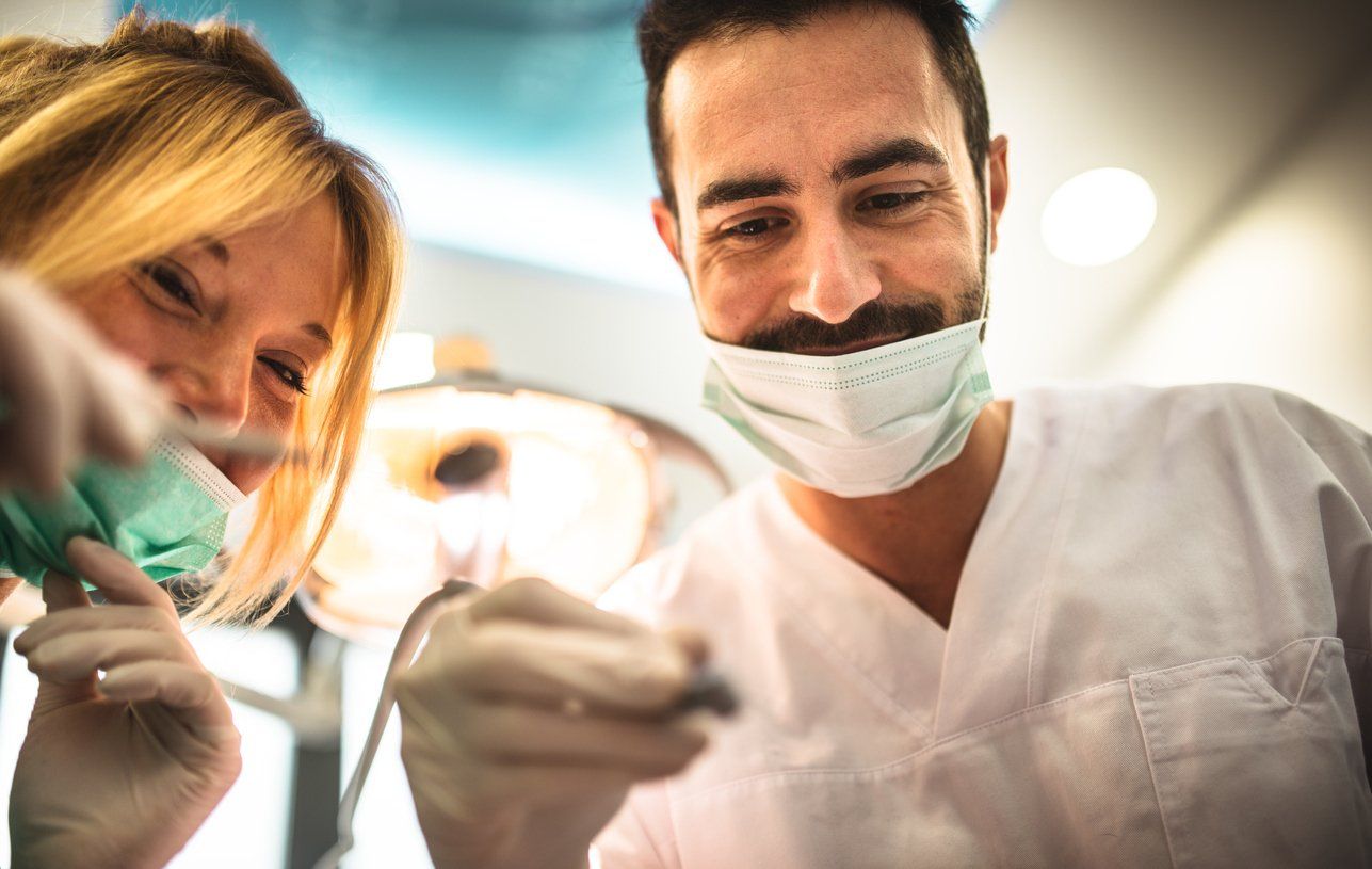 dentist taking care of a dental emergency