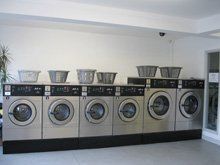 Washing and ironing service - Wrexham, Clwyd - Mrs. Robinson's Launderette - Washing Machine Washing and ironing service - Wrexham, Clwyd - Mrs. Robinson's Launderette - Washing Machine