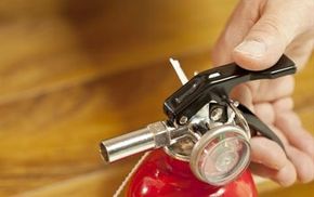 The top of a small fire extinguisher