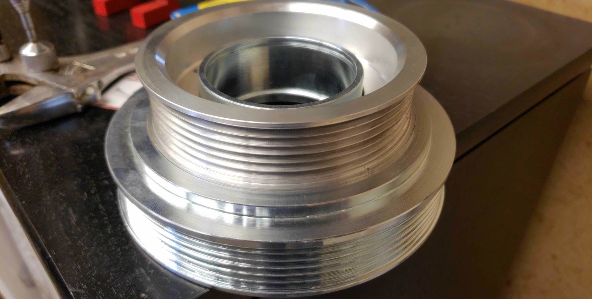 A close up of a metal object on a table.