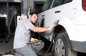 Body shop, dent and scratch repair.