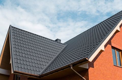 Roofing Repair — Roof of a House in Janesville, WI Roofing Repair — Roof of a House in Janesville, WI
