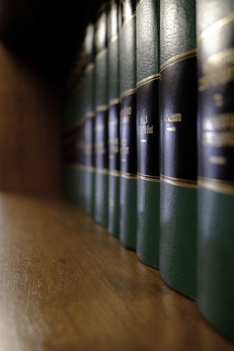 Legal law books on shelf with labels for learning understanding judicial case