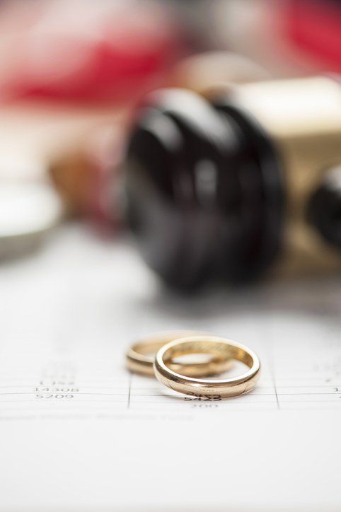 Gavel and wedding rings
