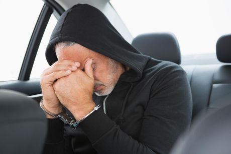 man being arrested by the police