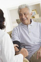 Man with Doctor, In-Home Health Care in Canton, MA Man with Doctor, In-Home Health Care in Canton, MA