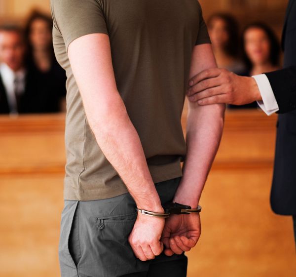 Handcuffed Man — Stafford, VA — All Night & Day Bailbonds Handcuffed Man — Stafford, VA — All Night & Day Bailbonds