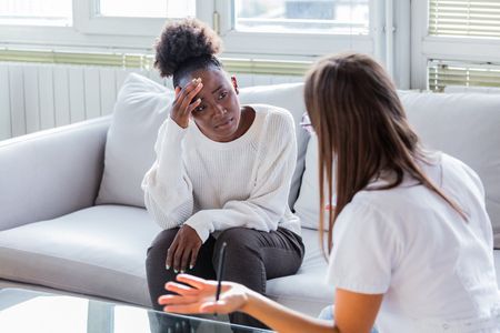 Female Counselor Helping Depressed Woman — Los Angeles, CA — Spiga and Associates Female Counselor Helping Depressed Woman — Los Angeles, CA — Spiga and Associates