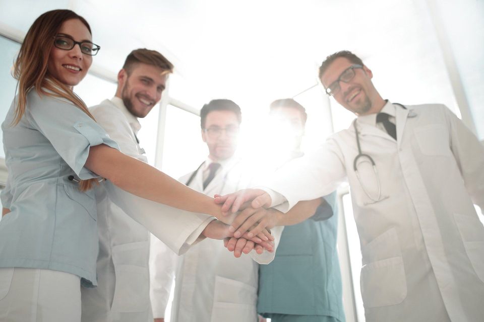 Doctors And Nurses Coordinate Hands — Los Angeles, CA — Spiga and Associates Doctors And Nurses Coordinate Hands — Los Angeles, CA — Spiga and Associates