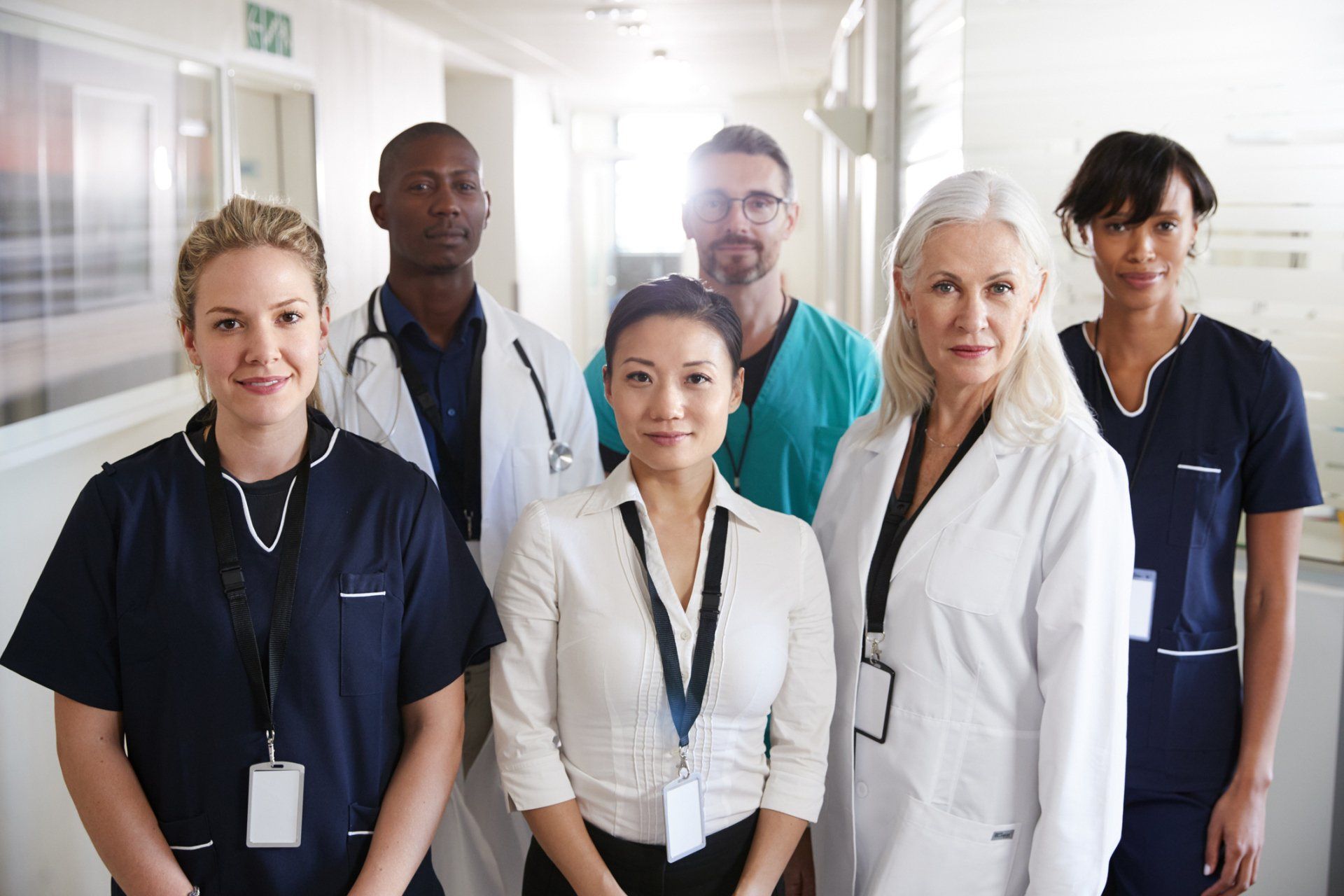 Medical Team Standing In Hospital Corridor — Los Angeles, CA — Spiga and Associates