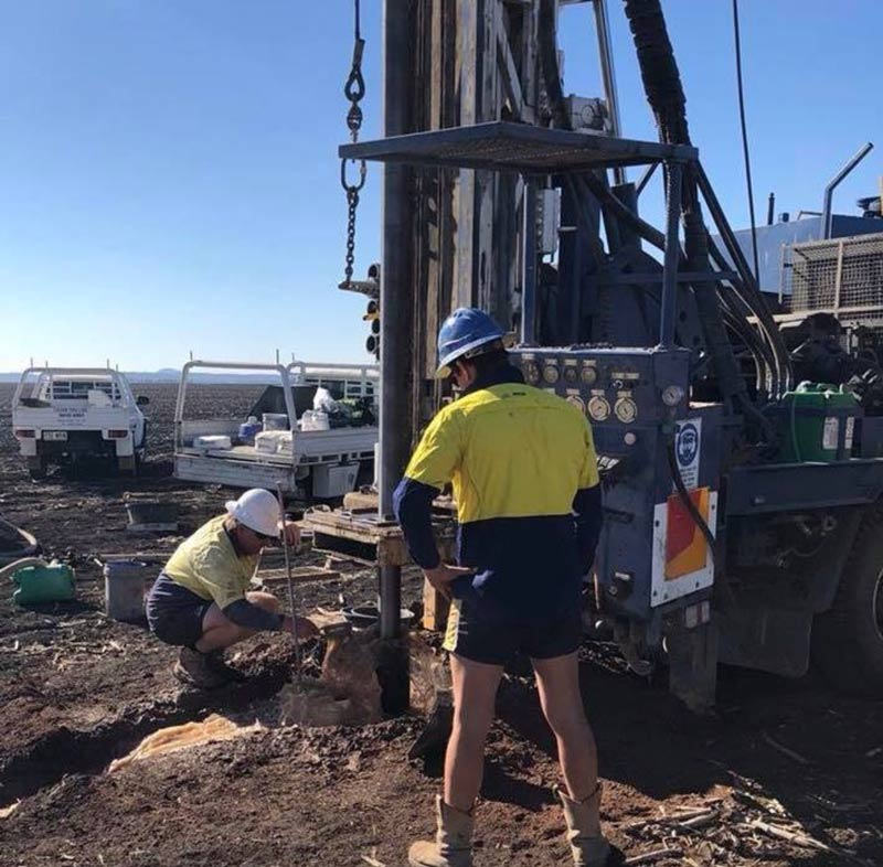Workers with Drill
