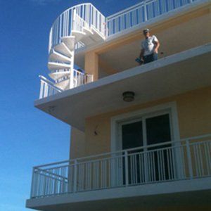 Rolling Gates — Guy Standing at Teris in Islamorada, FL