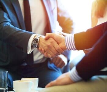 Attorney handshake with client — Attorney in Mchenry, IL Attorney handshake with client — Attorney in Mchenry, IL