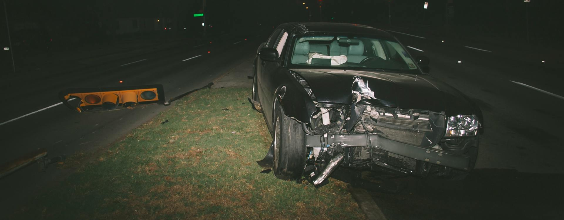 car on the side of the road in Bryan and College Station, TX after a crash
