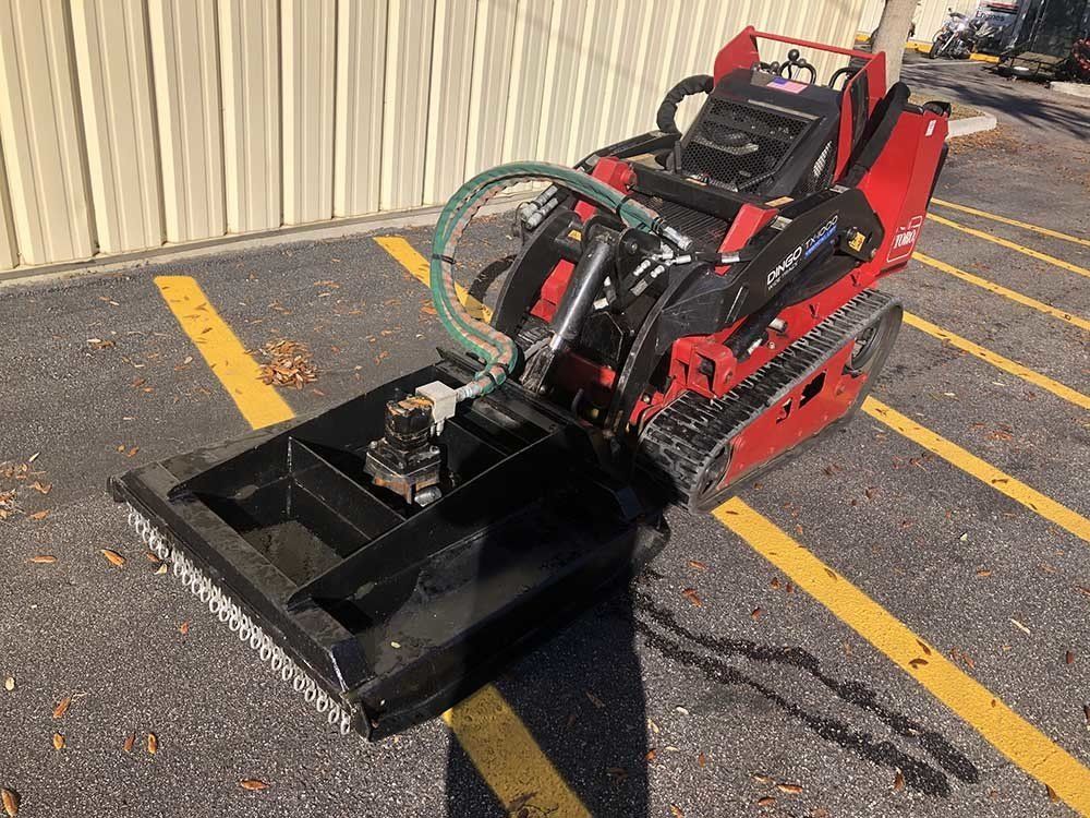 Red Mini Track Loader — Edgewater, FL — Grand Rental Station