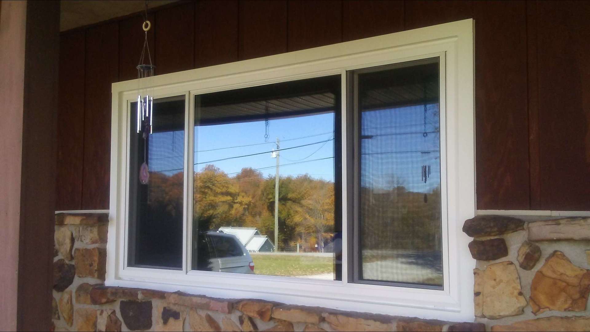 A large window on the side of a house