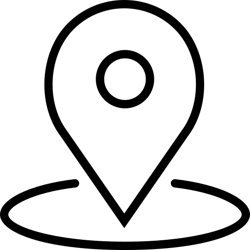 A map pin with a circle in the middle free icon