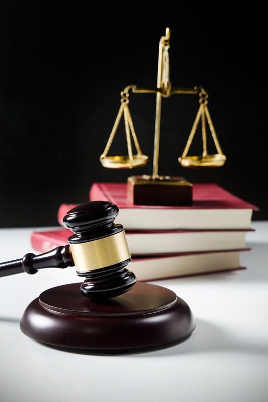 Wooden Gavel and Books on Wooden Table — Troy, OH — Shipman Dixon & Livingston LPA Attorneys at Law Wooden Gavel and Books on Wooden Table — Troy, OH — Shipman Dixon & Livingston LPA Attorneys at Law