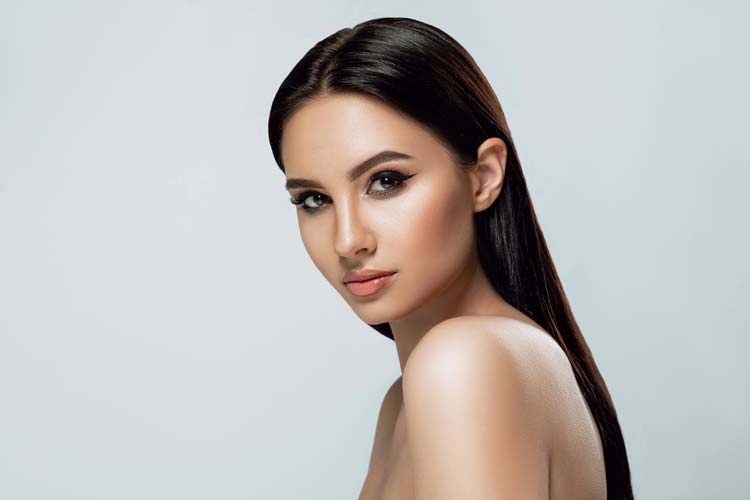 Brunette-woman-with-tanned-skin-and-brown-eyes