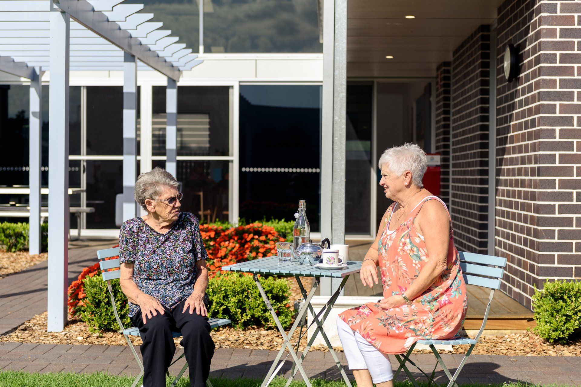 Two people sat at a table