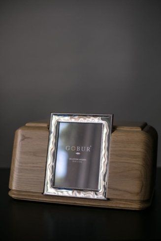 urna funeraria con portafoto