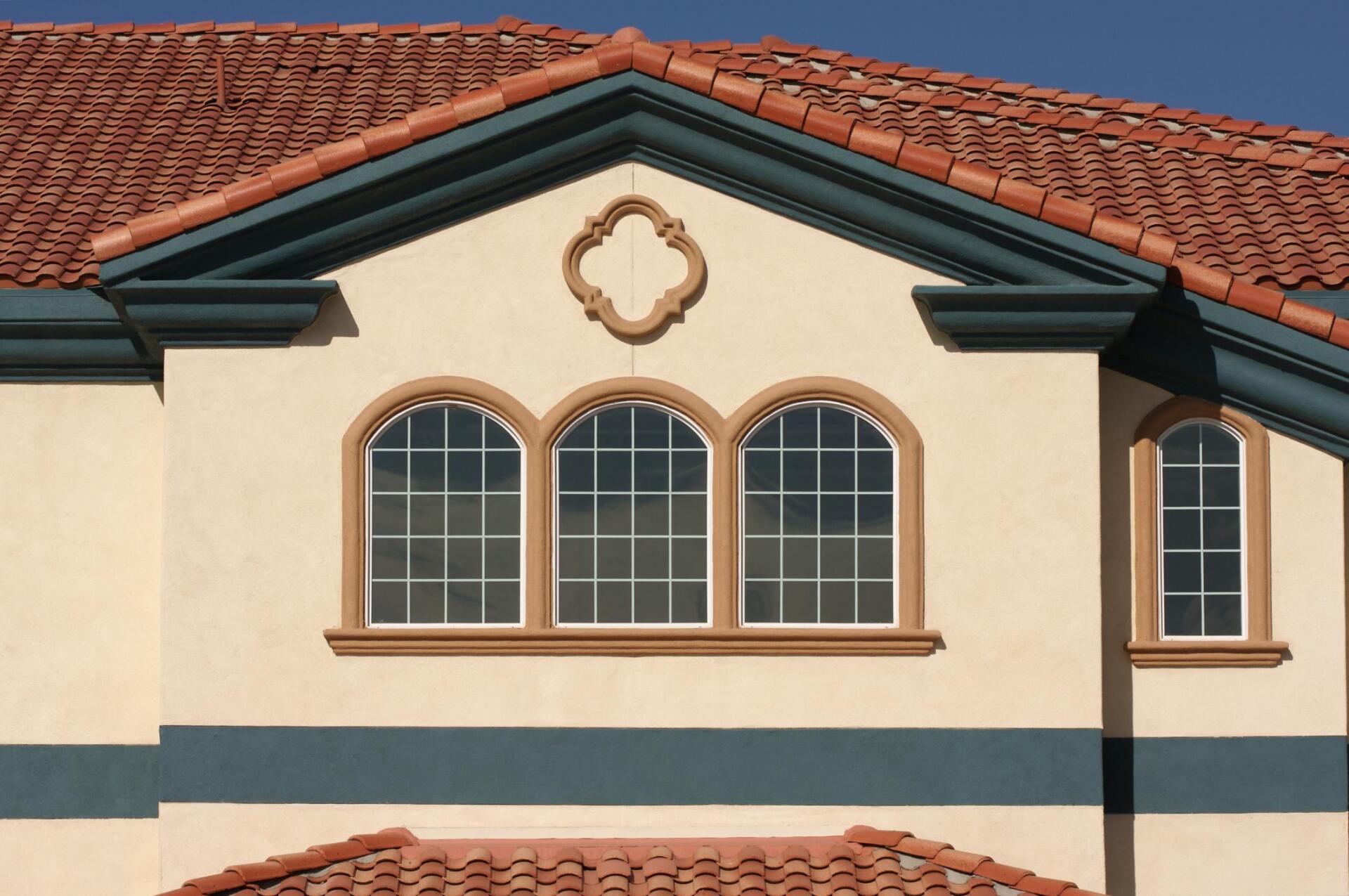 a house with brick stone roofing