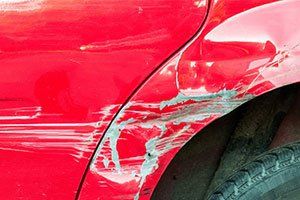 Auto Collision Shop — Red Damaged Car in Moraine, OH Auto Collision Shop — Red Damaged Car in Moraine, OH