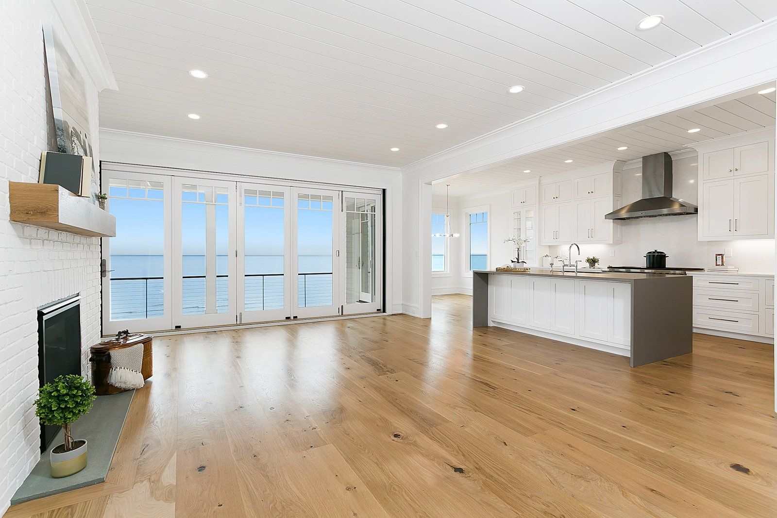White Kitchen Cabinets & Waterfall Countertop