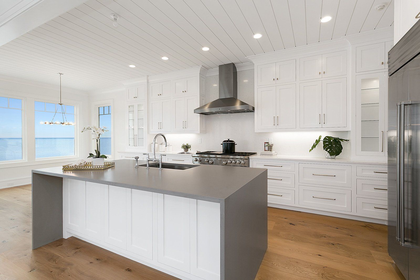 White Custom Kitchen & Gray Waterfall Countertop