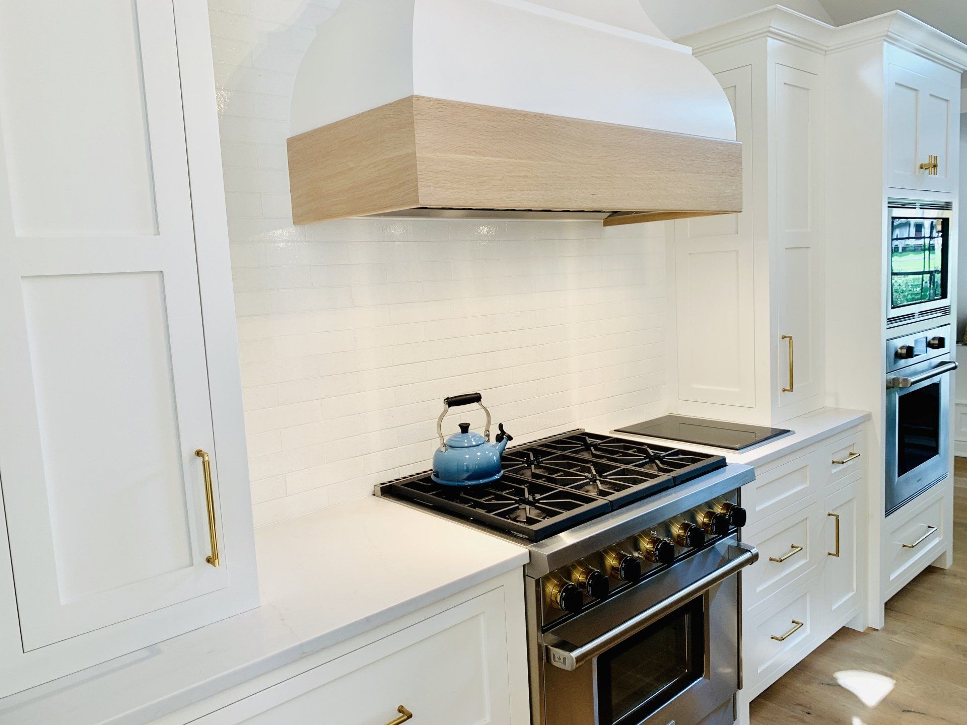 White Cabinets & White Backsplash