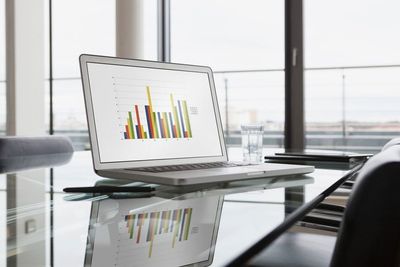 Accountant doing reports on a laptop