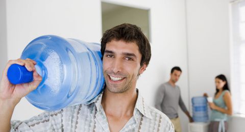 The Waterman carrying a water cooler