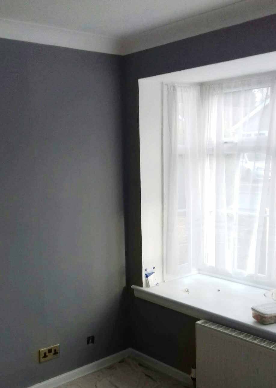 window covered by white curtain