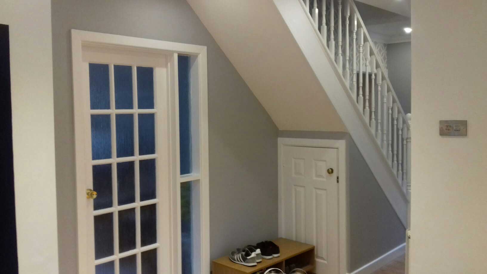 cupboard door underneath staircase