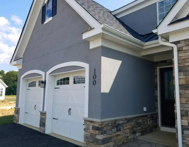 Hard Coat Stucco Installation — Exterior of Modern Home in Brick, NJ