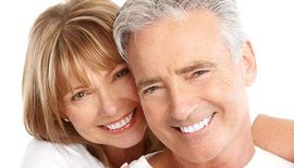 Sleep Dentistry older couple with brilliant smiles