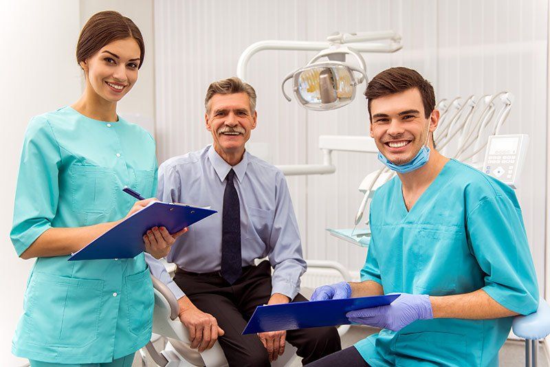 mandurah dental surgery deep cleaning friendly dentist with a senior patient