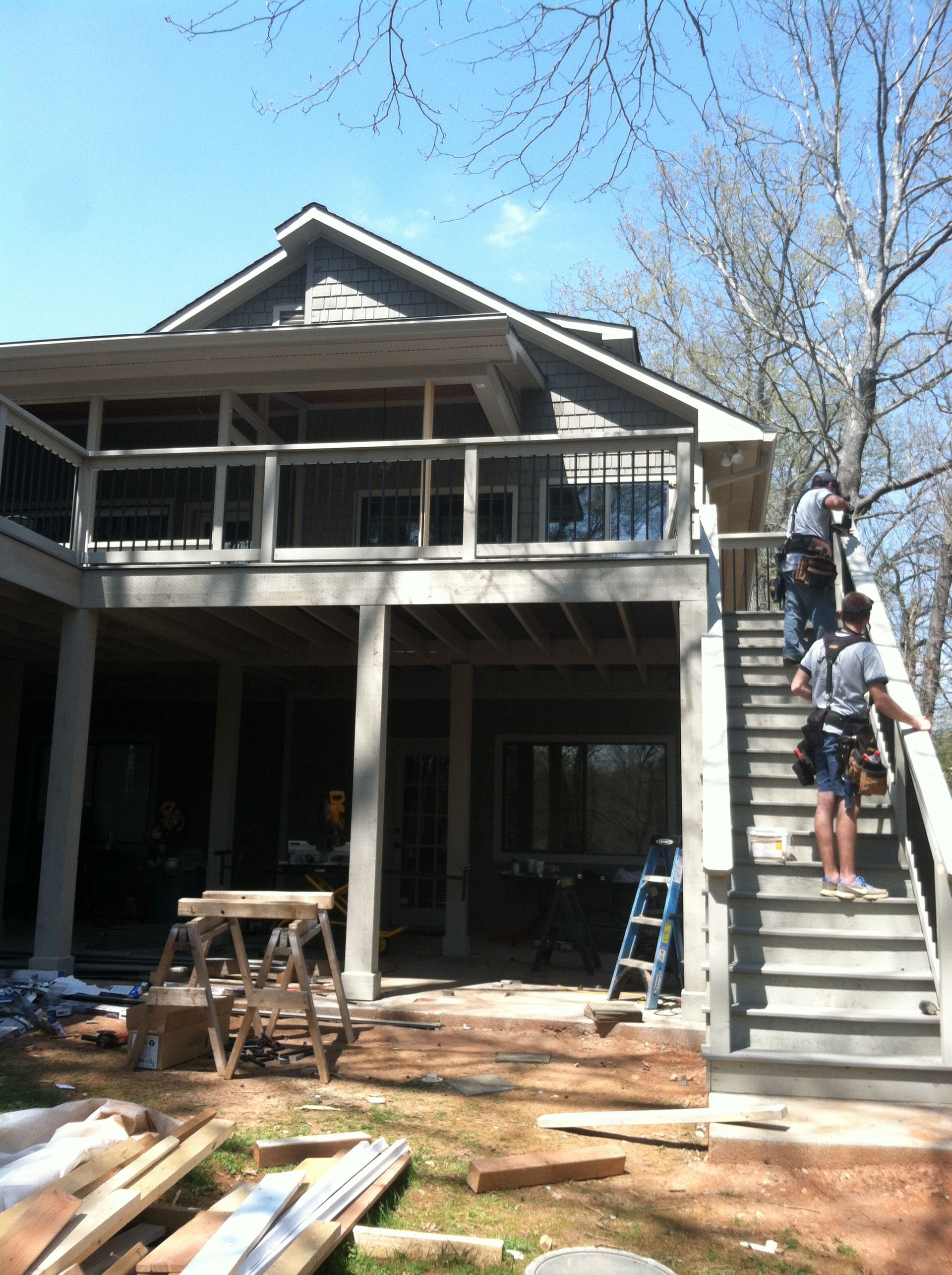 A house under construction with stairs leading up to it